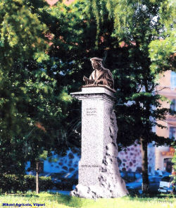 Luonnostelma Mikael Agricolan muistomerkistä Pietari-paavali kirkon edustalla Viipurissa.